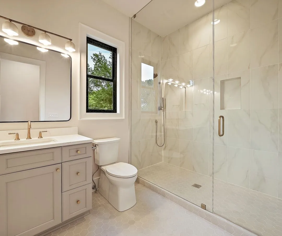R&B project: gray vanity and glass-enclosed shower